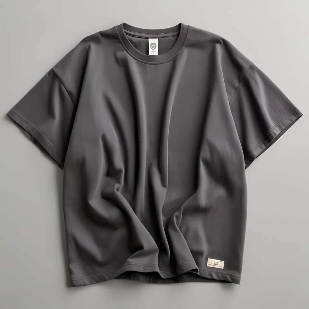 ComfortFit charcoal grey t-shirt displayed flat, an essential piece for custom branding.