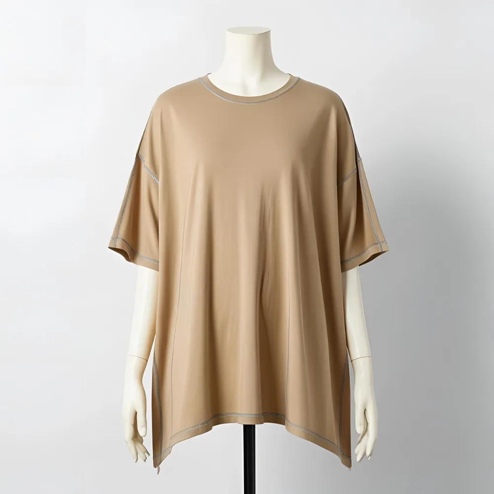Plain beige t-shirt displayed flat, showcasing comfort and production from a t-shirt factory nearby.