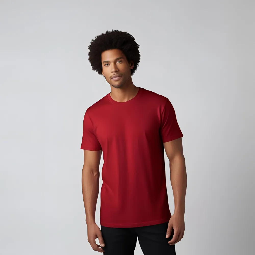 A man who appears to be of African descent modeling a crimson red cotton t-shirt. Title: Male Model Wearing Crimson Red Tee