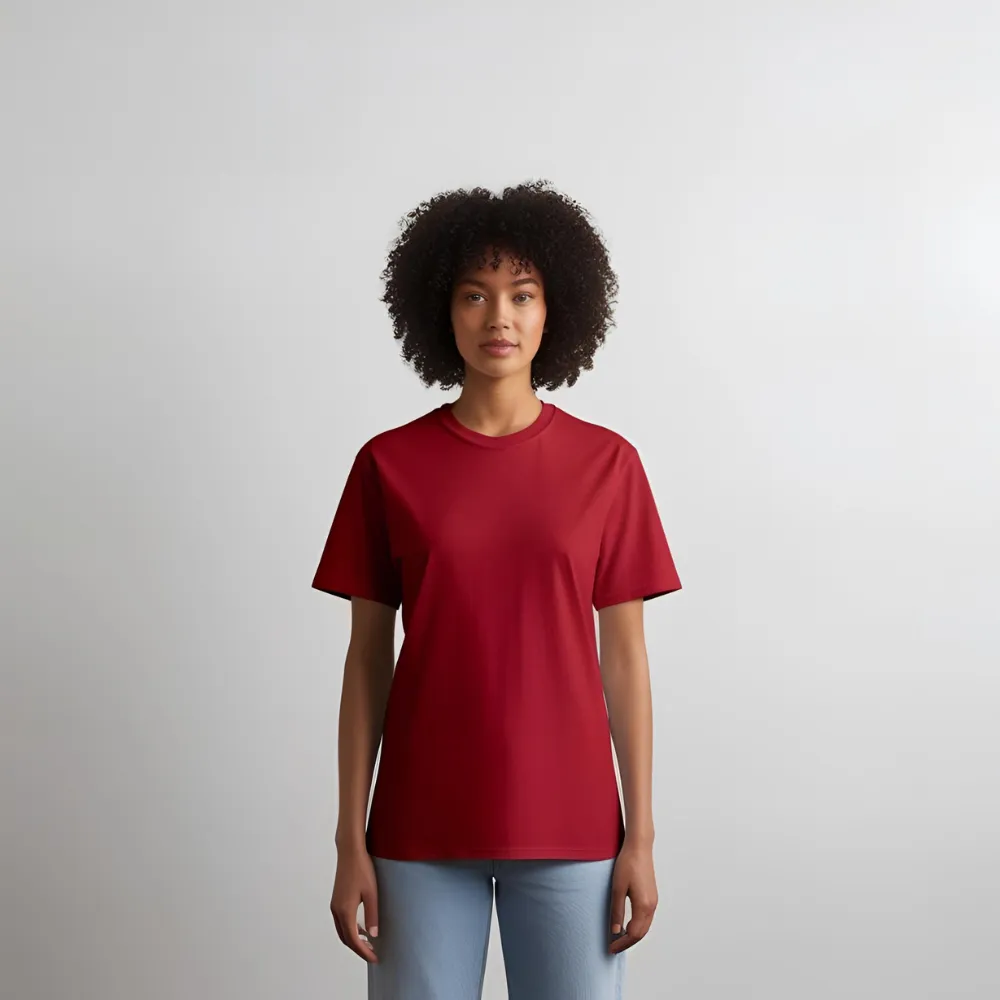 A woman who appears to be of African descent modeling a crimson red cotton t-shirt.