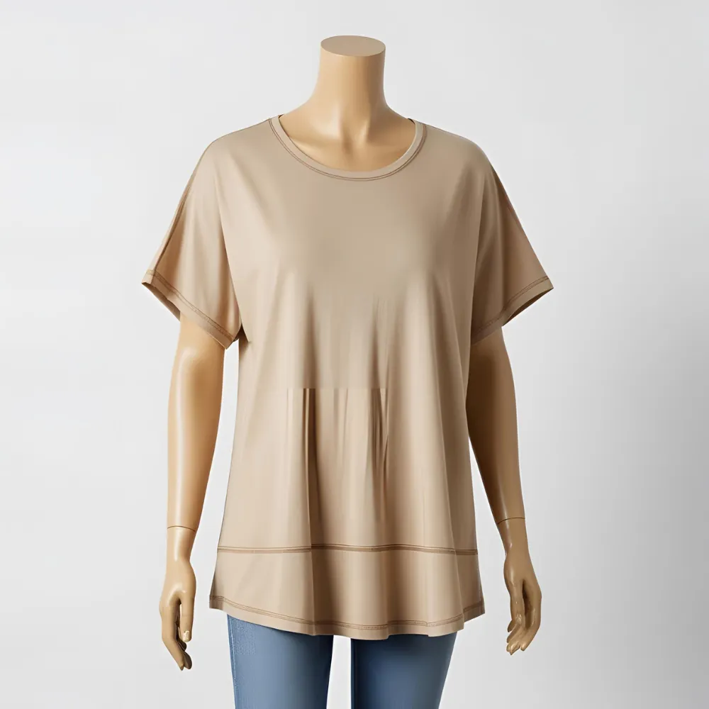 Beige ComfortFit t-shirt laid flat, emphasizing minimalist comfort from a nearby t-shirt factory.