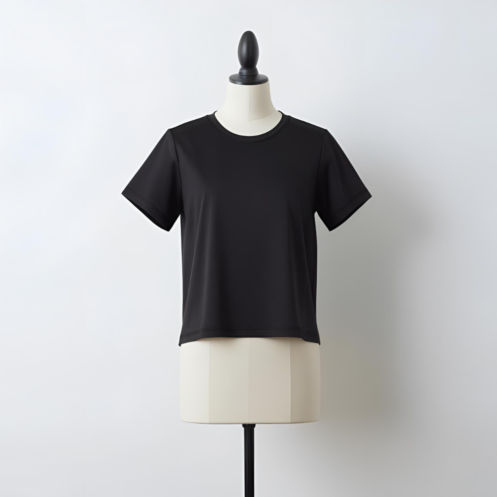 Minimalist black t-shirt on a neutral background, ideal for branding by a UK shirt manufacturer.