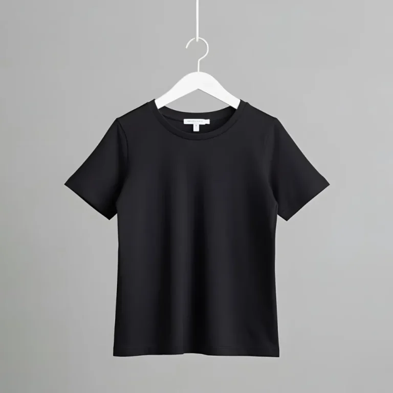 Elegant black t-shirt displayed on a white hanger against a grey background.