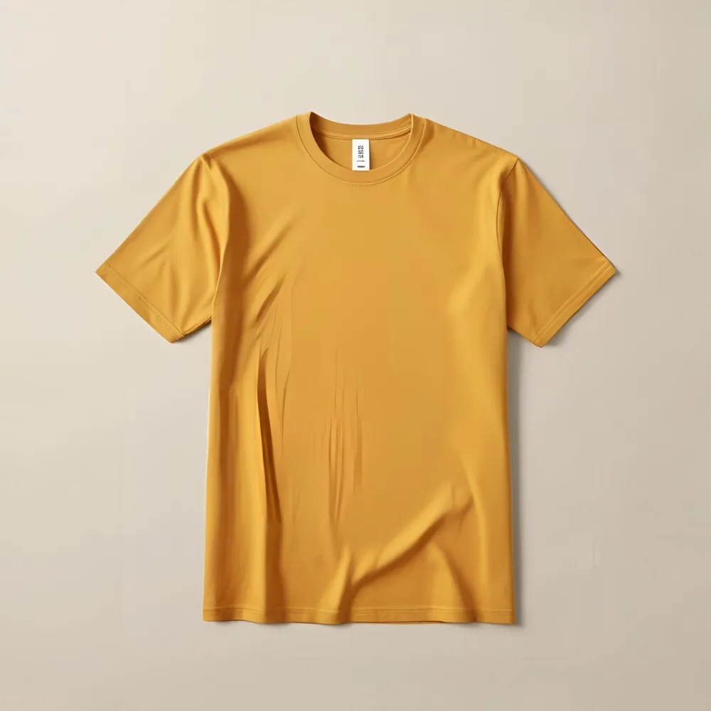 A slightly darker shade of mustard yellow cotton t-shirt laid flat.