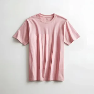 A pale pastel pink cotton t-shirt shown flat on a white backdrop.
