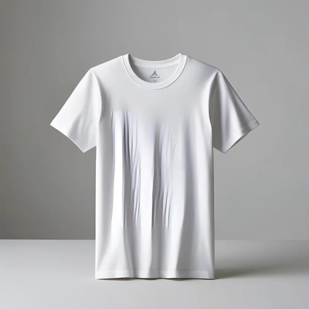 Simple white t-shirt laid flat on a light surface.