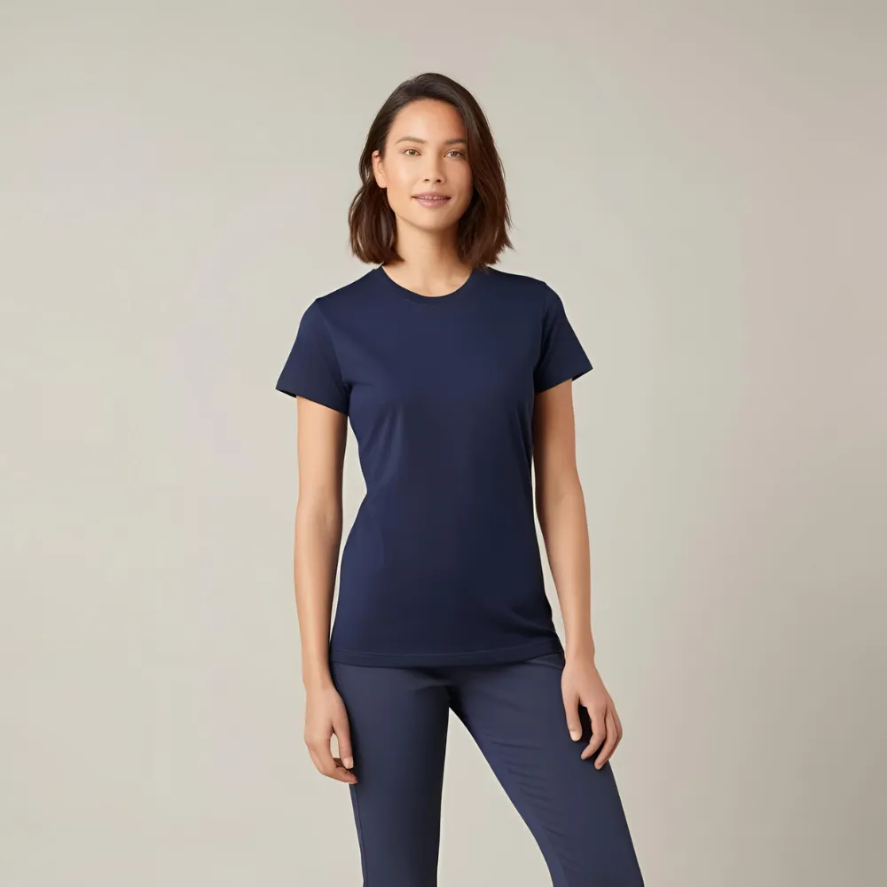 A woman who appears to be of European descent modeling a premium navy blue cotton t-shirt.